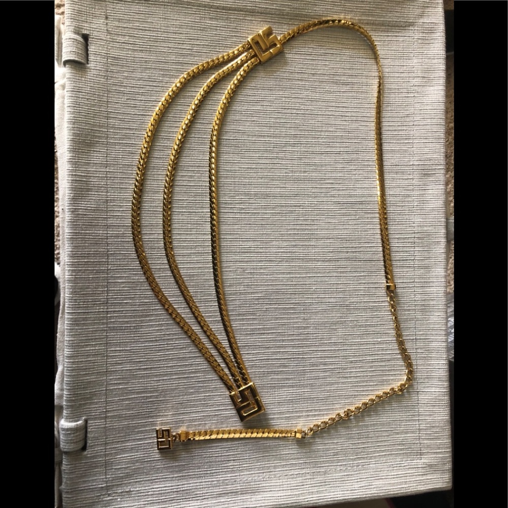 Beautiful St John gold tone belt